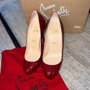 Christian Louboutin Rounded Toe Red Pumps